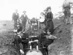 Electric caulking machine caulking the joints on the Goldfields Pipeline [picture]