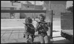 111676PD: Pat and Bert Bell eating watermelon at Rottnest, 1922