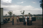 Bureau of Mineral Resources survey team and Derby teacher Brian Clarke (in hat and white shorts) at Napier Downs Station, May 1955 [picture]