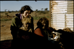 Betty McKeich with Marjorie, Eric and baby Clayton Watson at the Police Trackers Hut Camp, Kalgoorlie, July 1956 [picture]