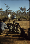 Dick Watson leading the singing with 'Big Ron' Williams playing the accordion at a prayer meeting at Cundeelee, November 1955 [picture]