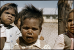 134352PD: L-R: Unknown, Hiram Woods, Peter Woods at Gnowangerup Mission, January 1958