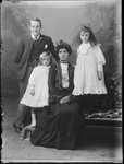 Studio portrait of the Harris family [picture]