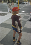 Boy selling copies of the Daily News newspaper in St. George's Terrace, Perth [picture]