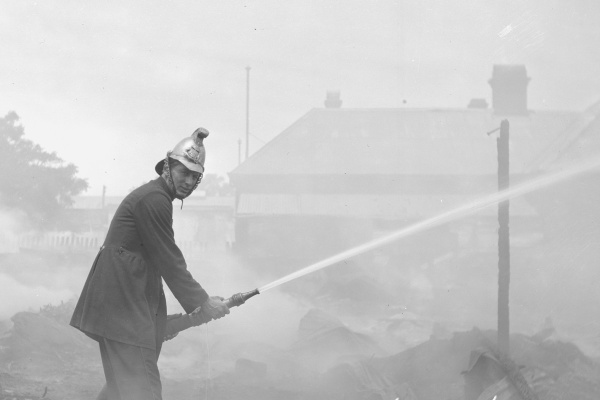 Fireman at a fire in John Street 1922