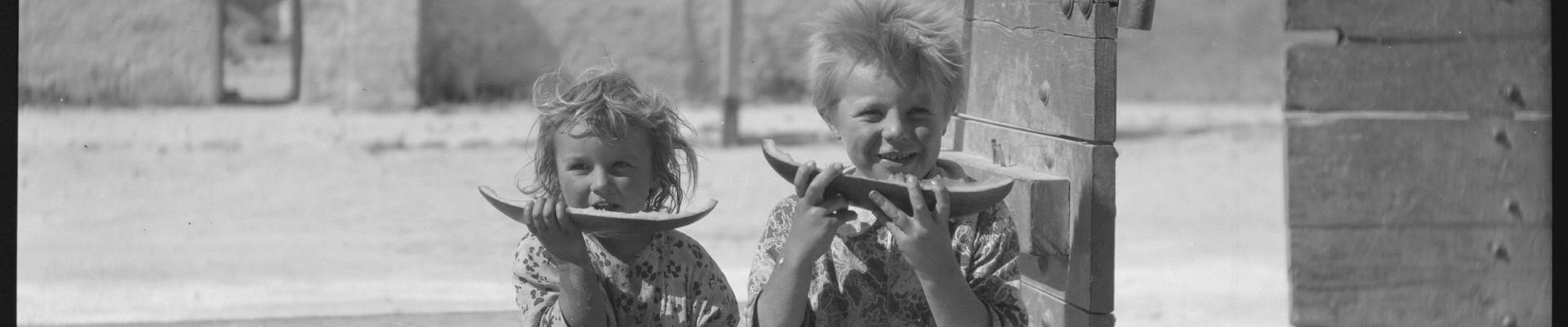 Pat and Bert Bell eating watermelon at Rottnest 1922