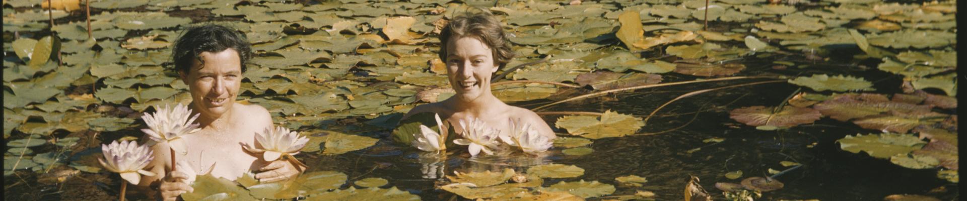 Dorrie Foord and Wilma Venville among the water lilies in Camera Pool c1958