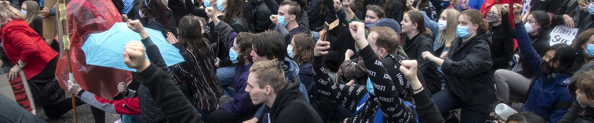 Protestors take the knee - in deference to George Floyds death at the hands of a police officer - for one minute at the intersection of St Georges Terrace and Barrack Street during the march at the 2nd Black Lives Matter protest rally