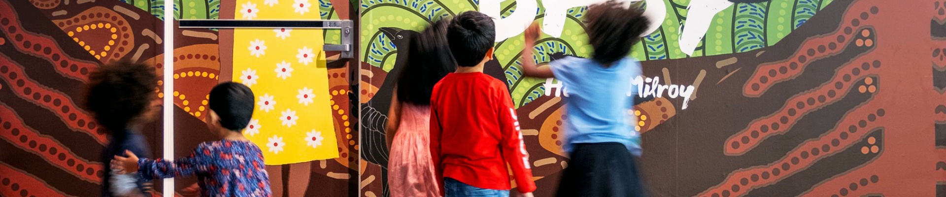 Children looking at the Crow Baby exhibition in the Story Place Gallery